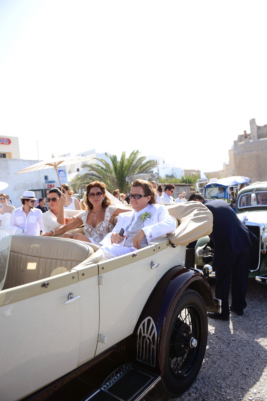 A celebrity wedding in Santorini at Katikies Hotel by wedding photographer Santorini XOANDREA